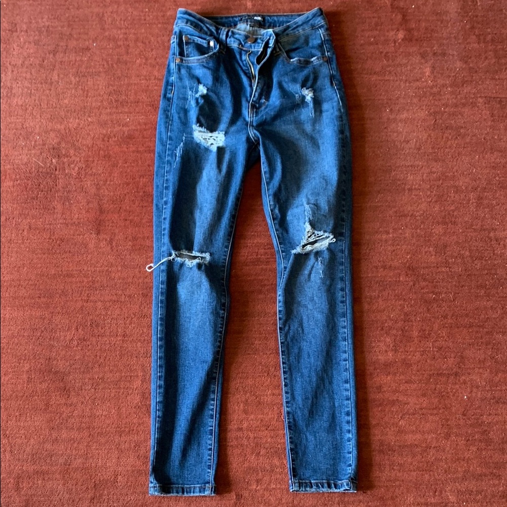 Women's Distressed Blue Jeans